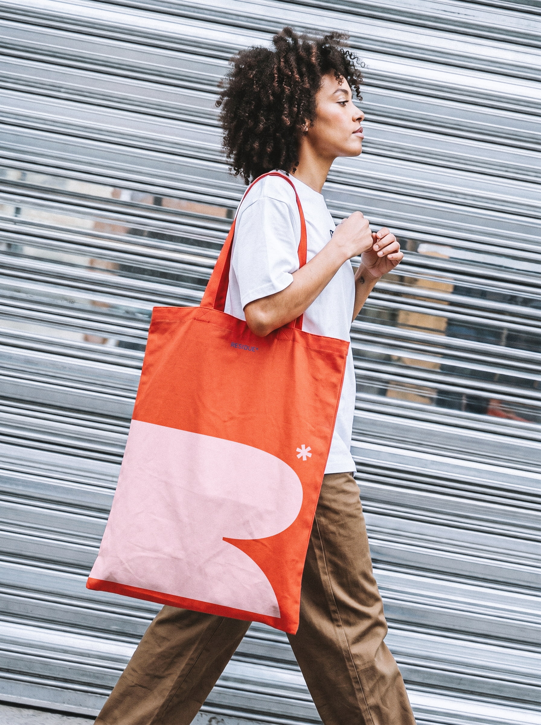 Brand identity and premium merchandise design showcasing a custom graphic canvas tote bag for a wellness and beauty brand