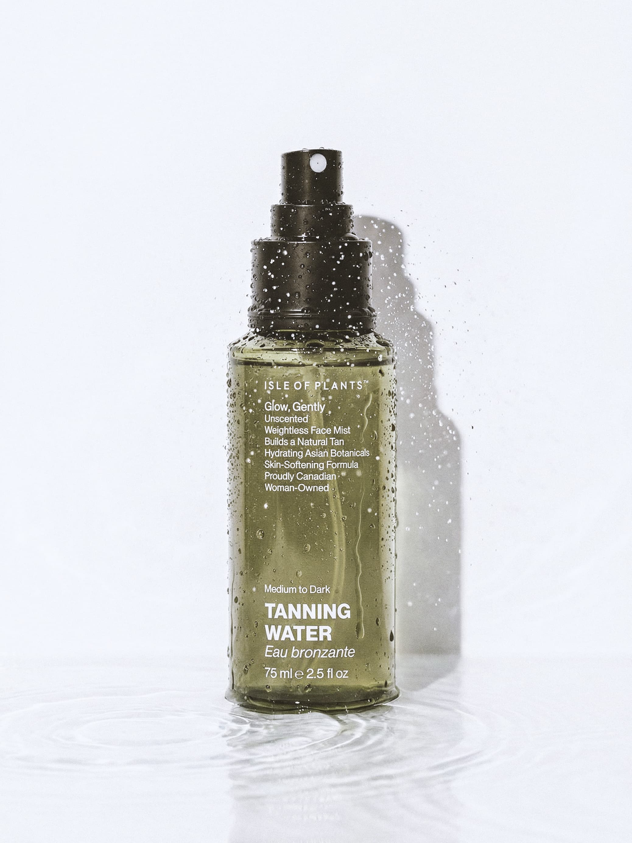 Photorealistic 3D product rendering showcasing a luxury glass spray bottle with fresh water splashes for a beauty brand