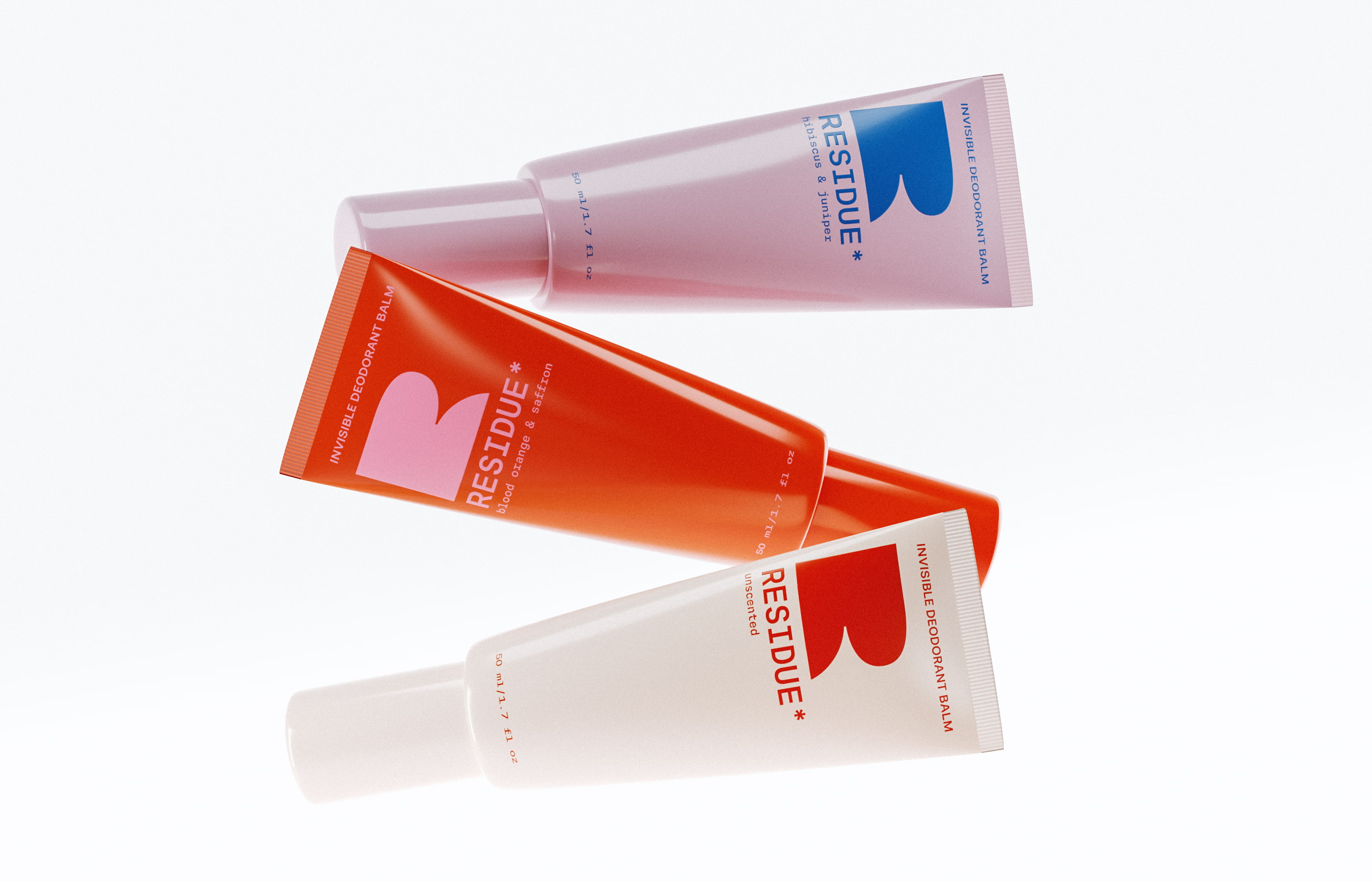 Commercial product photography and premium cosmetic packaging design execution showcasing three color deodorant balm tubes for Residue beauty brand