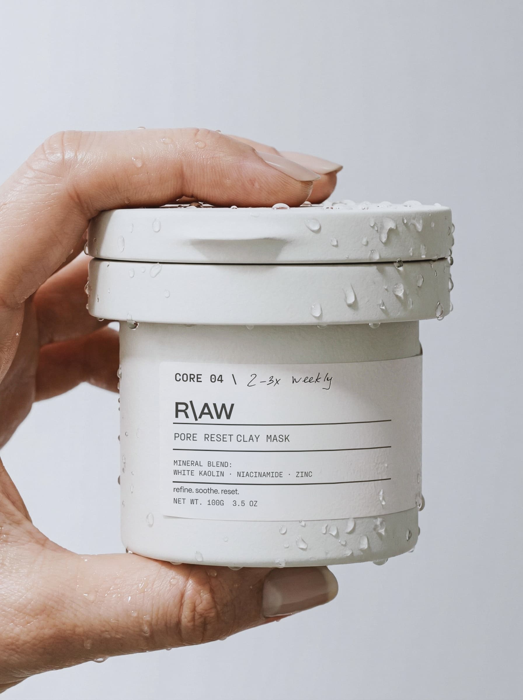 3D product rendering and skincare packaging design showcasing the R\AW dark clay mask jar and clean label layout